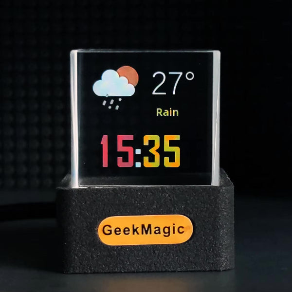 The Projection Rooms 3D Icon Desk Light Decor shows real-time weather with a rain cloud icon, Rain, and 27°C. It vibrantly displays the time as 15:35, with customizable options via mobile app.