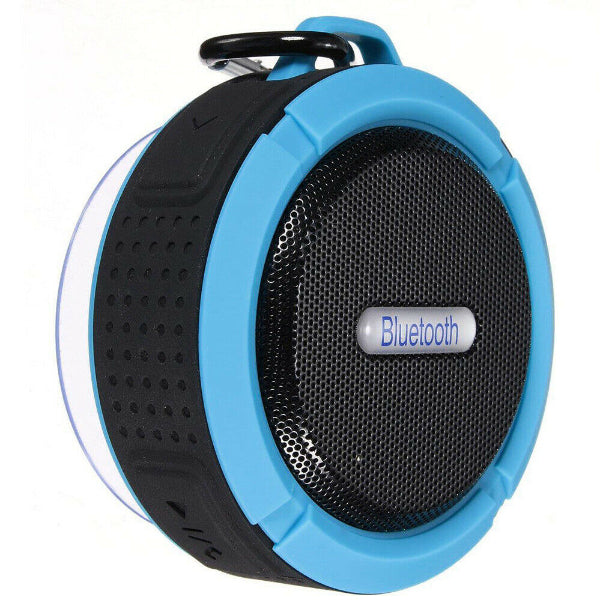 The Projection Rooms Portable Waterproof Wireless Mini Bluetooth Music Speaker is a round black device with a blue rubber casing and top carabiner for easy hanging. Bluetooth on the grille signifies wireless use. It provides high-fidelity sound and has small triangular patterns for grip.