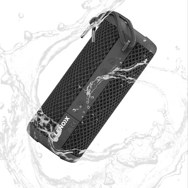 The Projection Rooms IPX7 Waterproof & Portable Bluetooth Speaker, with a textured black surface, is shown being splashed with water. It features 360° sound dispersion and a top corner strap against a white background, highlighting its water-resistant quality.